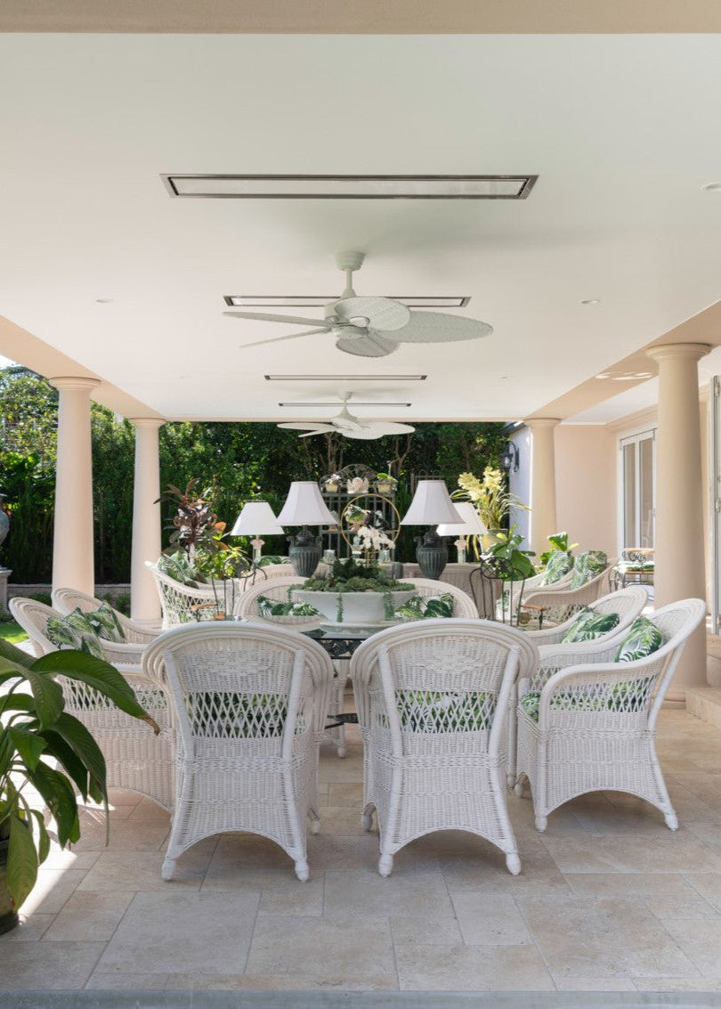Bromic Platinum Smart-Heat Electric Patio Heater in a covered patio setting