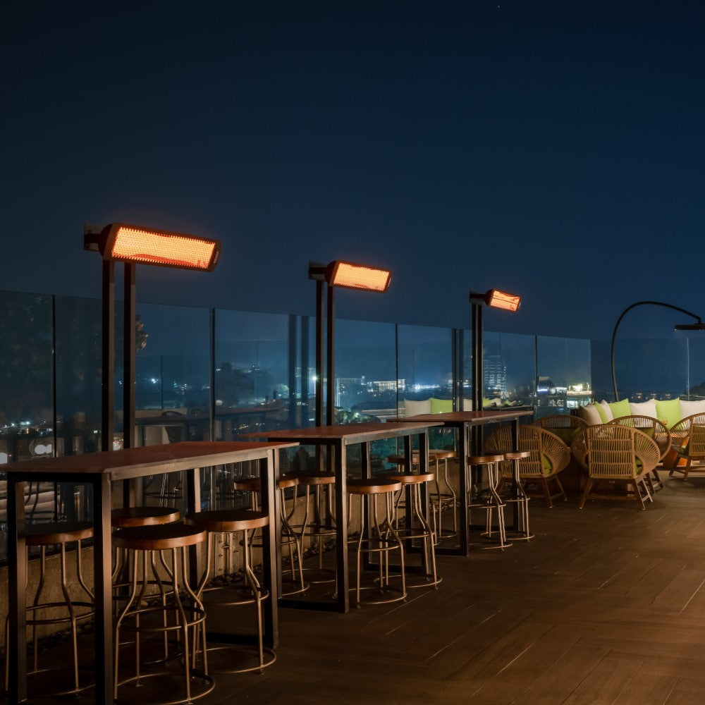 Bromic Tungsten Smart-Heat Electric Patio Heater in an outdoor dining setting