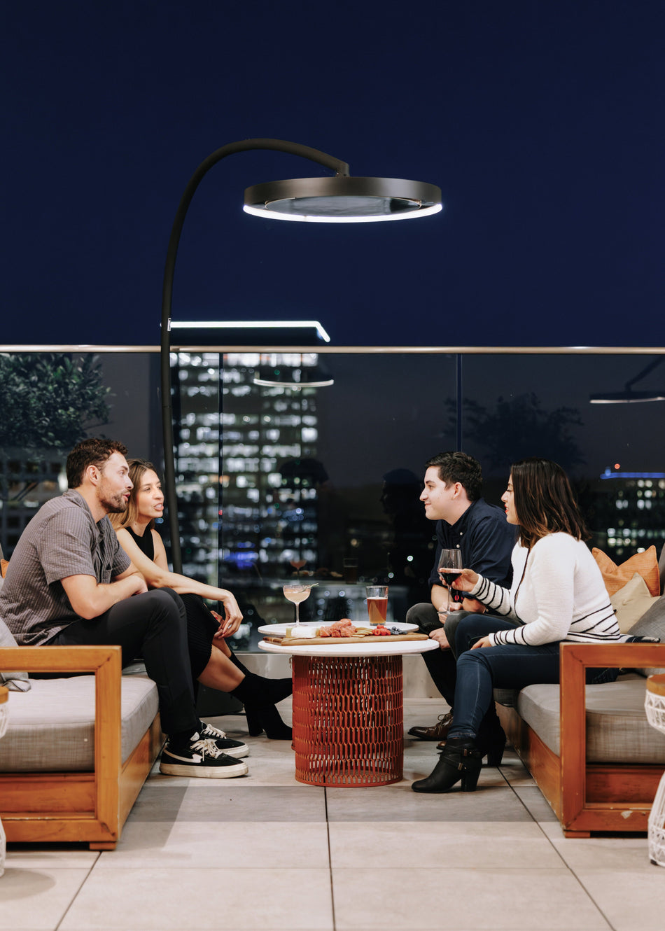 Bromic Eclipse Smart-Heat Electric Freestanding Patio Heater in an outdoor lifestyle setting